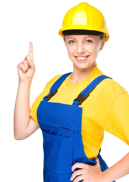 Young construction worker pointing up — Stock Photo, Image