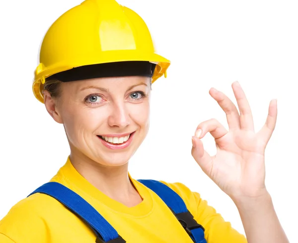 Young construction worker is showing OK sign — Stock Photo, Image