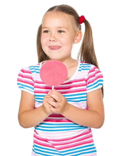 Klein meisje met lolly — Stockfoto