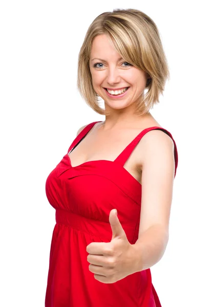 Woman is showing thumb up gesture — Stock Photo, Image