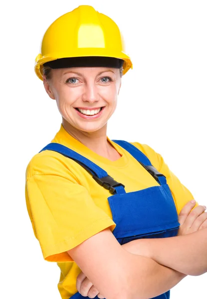 एक निर्माण कार्यकर्ता के रूप में युवा खुश महिला — स्टॉक फ़ोटो, इमेज