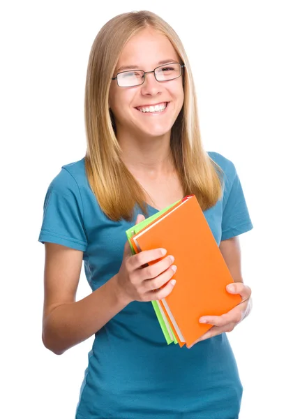 Jonge student meisje houdt boek — Stockfoto
