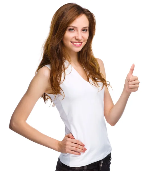 Woman is showing thumb up gesture — Stock Photo, Image