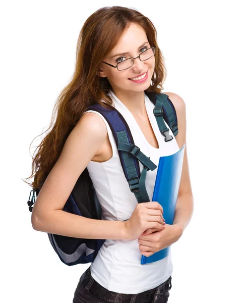 Young student girl is holding book Stock Picture