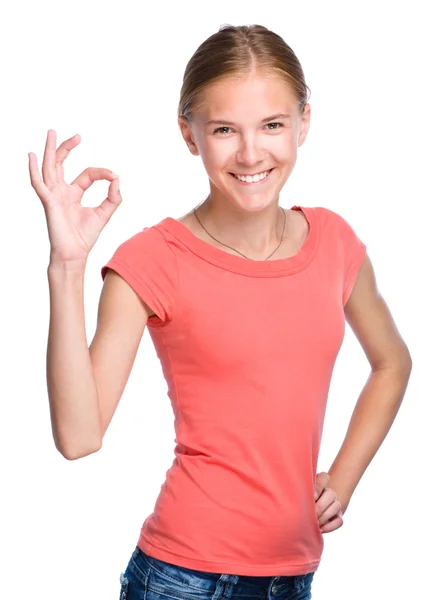 Junge teen Mädchen ist zeigen ok Zeichen — Stockfoto