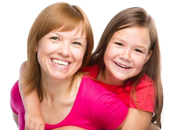 Portrait of a happy mother with her daughter Stock Photo