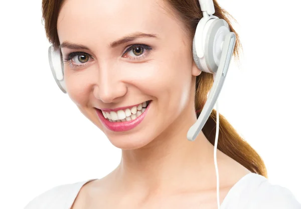 Lovely young woman is talking to customers — Stock Photo, Image