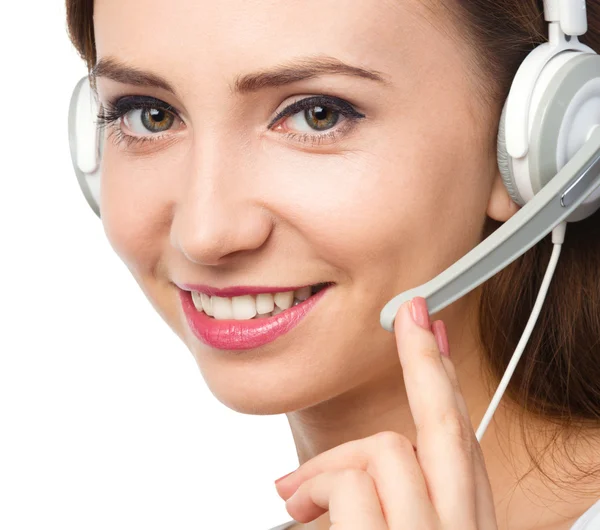 Lovely young woman is talking to customers — Stock Photo, Image