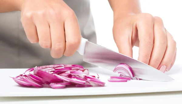 Cook is chopping onion — Stock Photo, Image