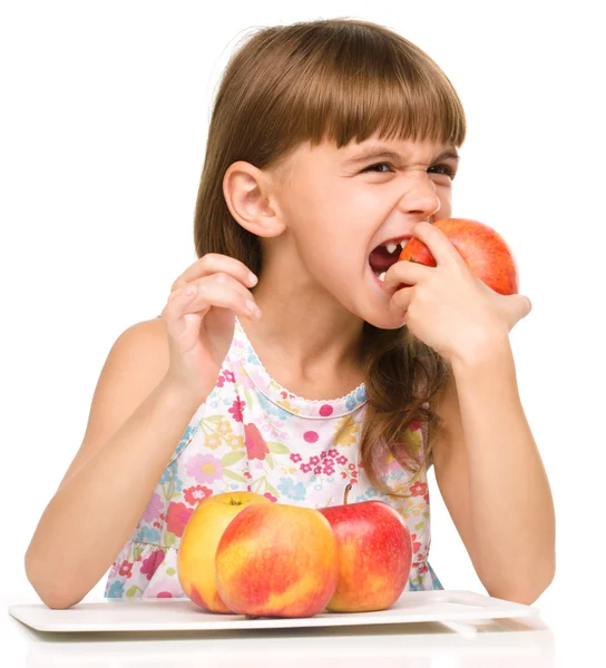 Niña con manzanas rojas —  Fotos de Stock