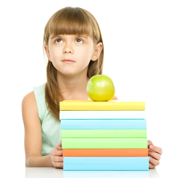 Kleines Mädchen mit ihren Büchern — Stockfoto