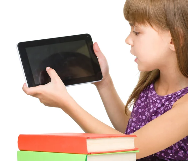 Young girl is showing tablet — Stock Photo, Image