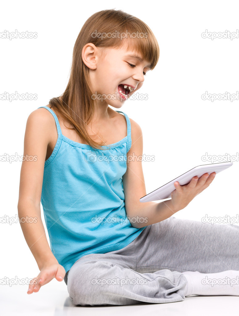 Young girl is using tablet