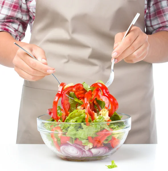 Cook is mixing salad — Stock Photo, Image