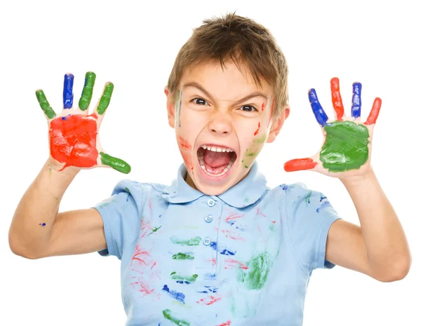 Portrait of a cute boy playing with paints — Stock Photo, Image