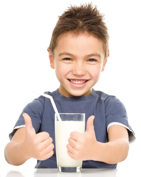 Cute boy with a glass of milk — Stock Photo, Image