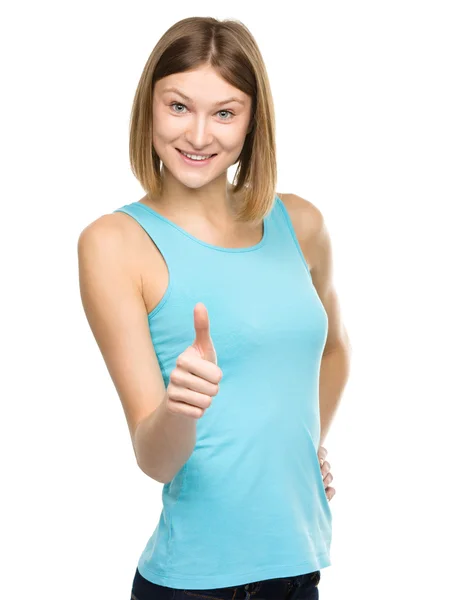 Woman is showing thumb up gesture — Stock Photo, Image