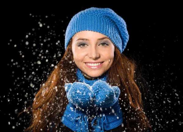 Young happy woman under snowfall — Stock Photo, Image