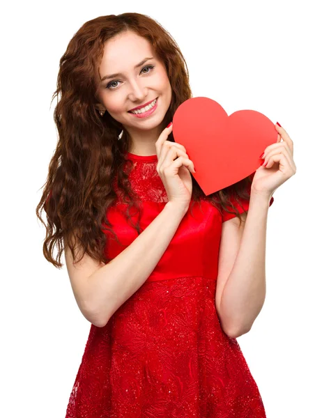 Młoda kobieta z czerwonym sercem — Zdjęcie stockowe