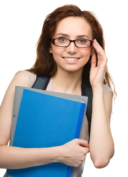 Junge Studentin hält Buch in der Hand — Stockfoto