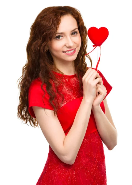 Young woman holding red heart — Stock Photo, Image