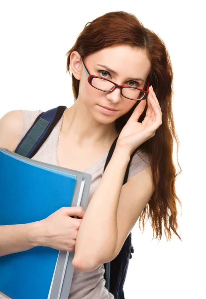 Joven estudiante chica está sosteniendo libro — Foto de Stock