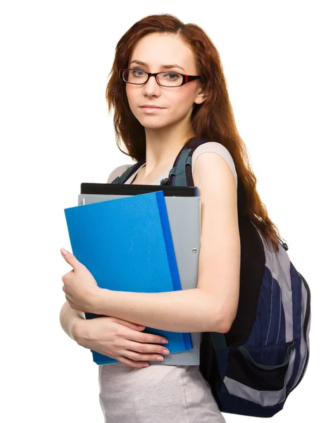 Young student girl is holding book Royalty Free Stock Photos