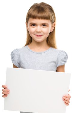 Little girl is holding blank banner clipart