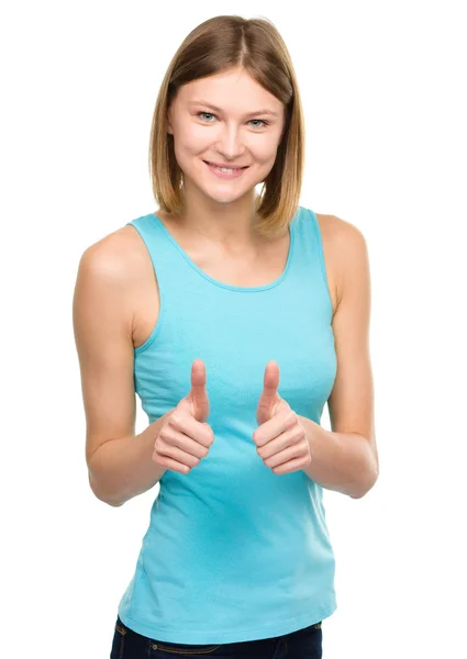 Woman is showing thumb up gesture — Stock Photo, Image