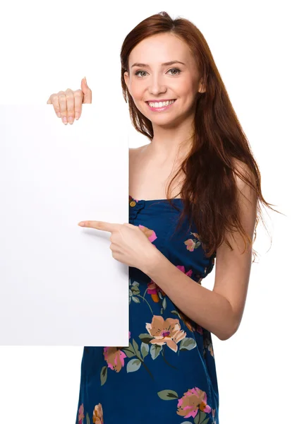 Ung kvinna håller Tom banner — Stockfoto