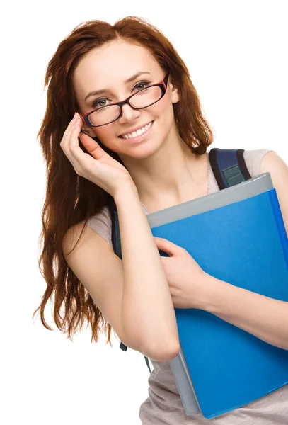 Junge Studentin hält Buch in der Hand — Stockfoto