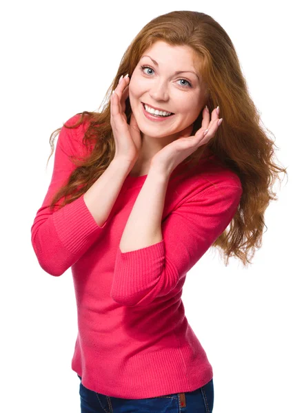 Woman is holding her face in astonishment — Stock Photo, Image