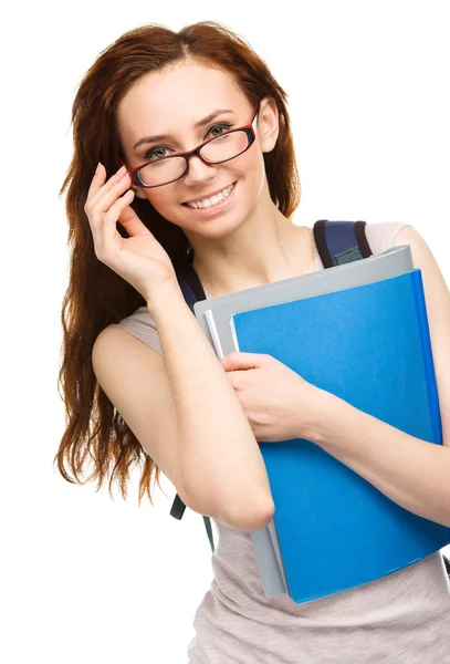 Genç öğrenci kız kitap tutuyor — Stok fotoğraf