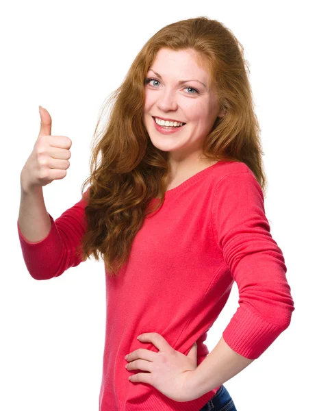 Woman is showing thumb up gesture — Stock Photo, Image