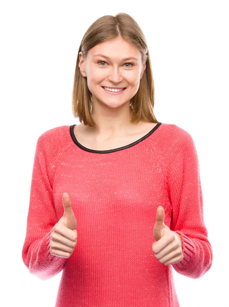 Woman is showing thumb up gesture — Stock Photo, Image