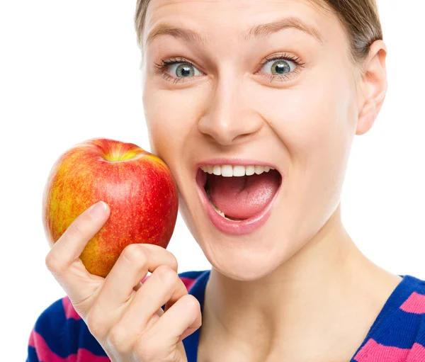 Joven chica feliz con manzana — Foto de Stock