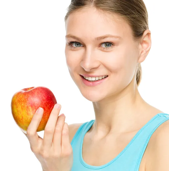Szczęśliwa dziewczyna z jabłkiem — Zdjęcie stockowe