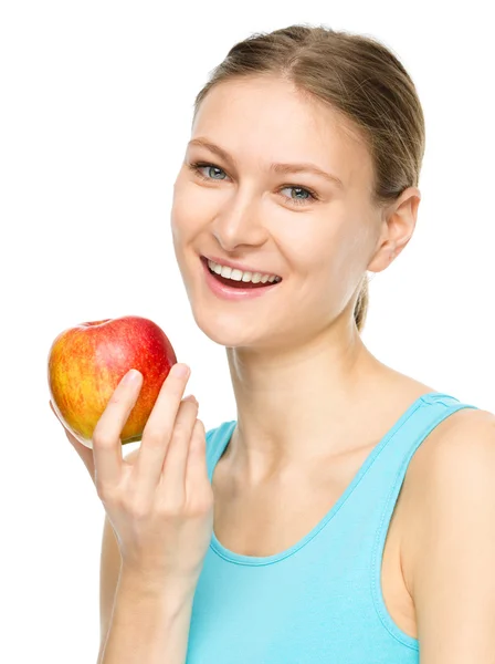 Young happy girl with apple — Stock Photo, Image