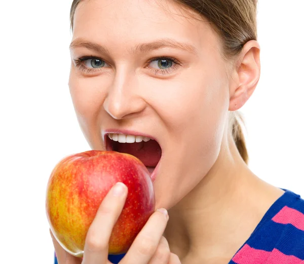 Young happy girl with apple — Stock Photo, Image