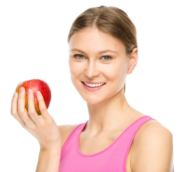 Young happy girl with apple — Stock Photo, Image