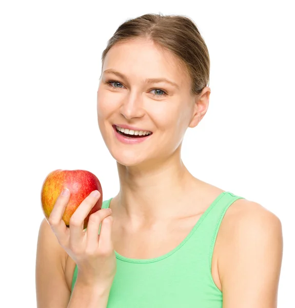 Joven chica feliz con manzana — Foto de Stock