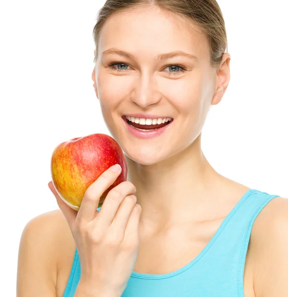 Joven chica feliz con manzana — Foto de Stock