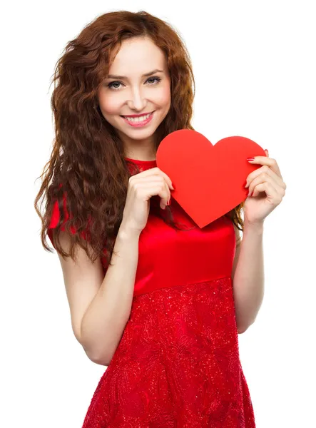 Young woman holding red heart — Stock Photo, Image