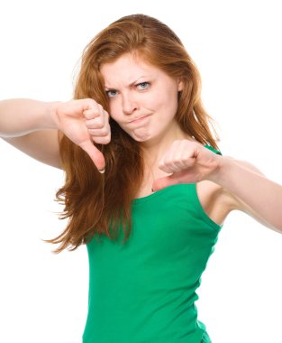 Woman is showing thumb down gesture clipart