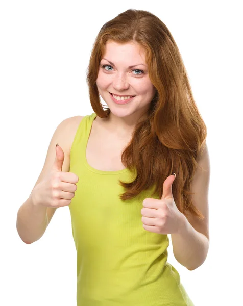 Woman is showing thumb up gesture — Stock Photo, Image