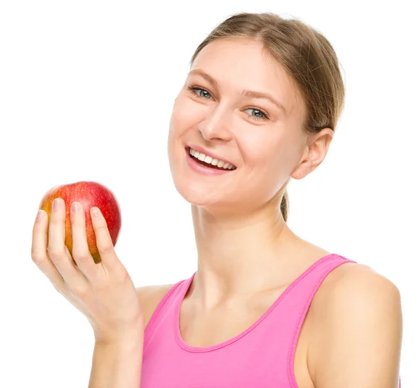 Joven chica feliz con manzana — Foto de Stock