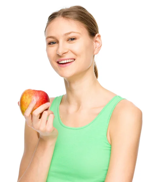 Joven chica feliz con manzana — Foto de Stock