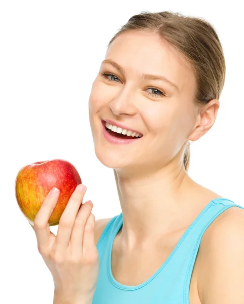 Joven chica feliz con manzana — Foto de Stock