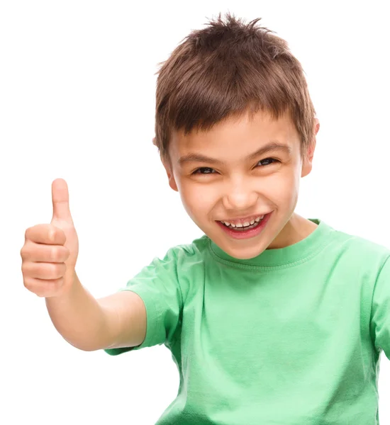 Kleine jongen vertoont duim omhoog teken — Stockfoto