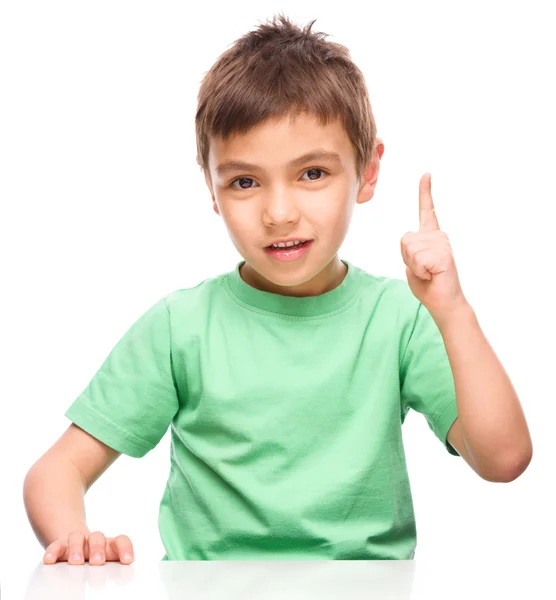 Little boy is pointing up using his index finger Royalty Free Stock Images